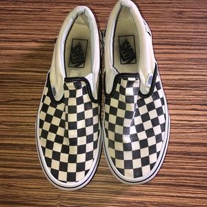 Worn slip on checkered vans